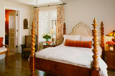 Inspiration for an eclectic guest medium tone wood floor bedroom remodel in Los Angeles with white walls