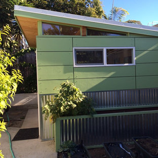 Foto de habitación de invitados moderna, de tamaño medio, con paredes verdes