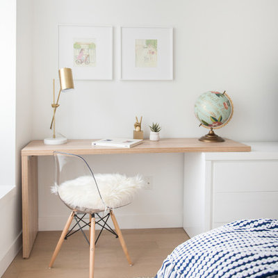 Inspiration for a mid-sized scandinavian master light wood floor and beige floor bedroom remodel in Miami with white walls and no fireplace