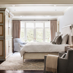 Example of a large classic master dark wood floor and brown floor bedroom design in San Francisco with gray walls and no fireplace