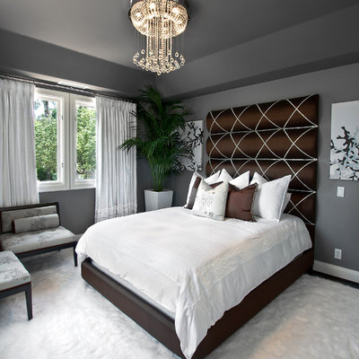 Inspiration for a transitional carpeted bedroom remodel in Orange County with gray walls
