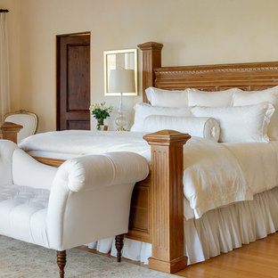 Design ideas for a mediterranean bedroom in Santa Barbara with beige walls.