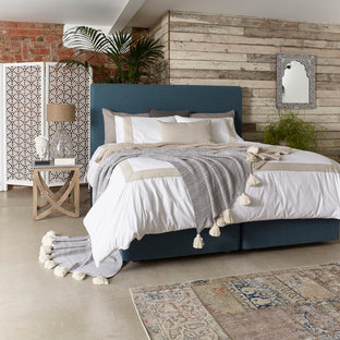 Photo of a scandi bedroom in Other with beige floors.