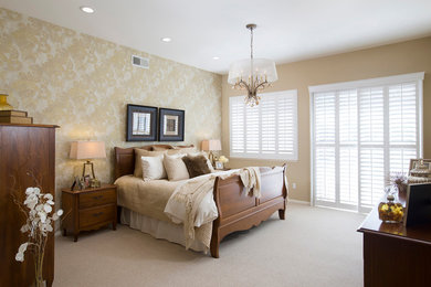 Design ideas for a large traditional master bedroom in San Diego with beige walls, carpet and no fireplace.