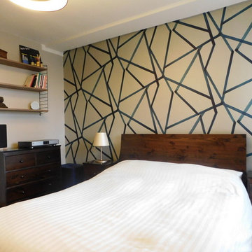 SE1: Masculine Bedroom with dark wood and geometric elements
