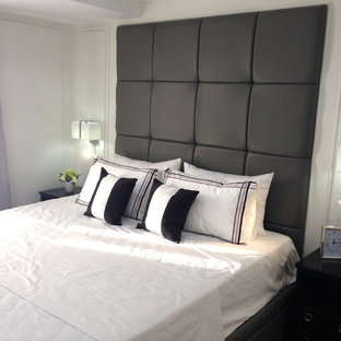 Diseño de dormitorio principal, actual, pequeño, sin chimenea, con suelo vinílico y paredes blancas