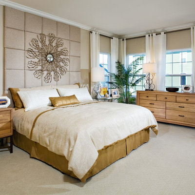 Example of a trendy carpeted bedroom design in Baltimore with beige walls