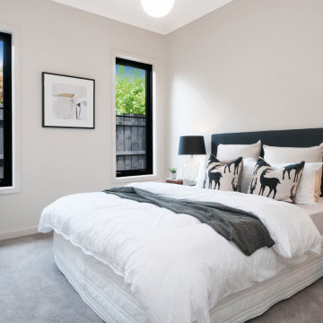 Two Aluminium Awning Windows in a bedroom