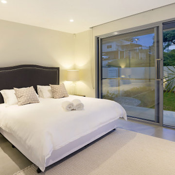Aluminium Sliding Door with an architectural handle in a bedroom