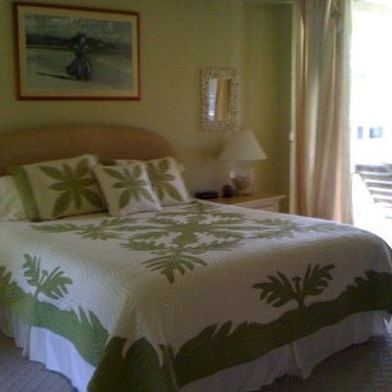 Simple island designed headboard & Hawaiian quilts are pure traditional