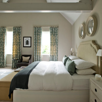Example of a trendy master bedroom design in Gloucestershire with beige walls