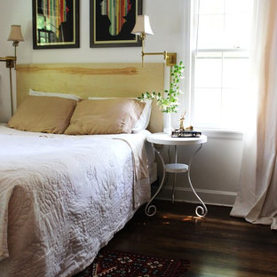 Inspiration for a small eclectic dark wood floor bedroom remodel in San Francisco with white walls