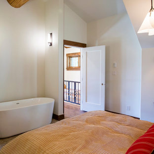 Inspiration for a mid-sized arts and crafts master bedroom in Vancouver with white walls and ceramic floors.