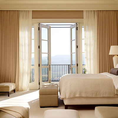 Elegant carpeted bedroom photo in San Francisco with beige walls