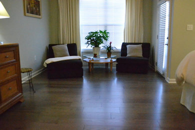 Example of a mid-sized classic master dark wood floor bedroom design in Atlanta with beige walls and no fireplace