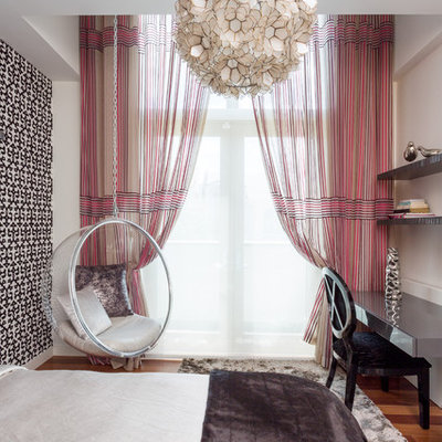 Inspiration for a mid-sized contemporary guest medium tone wood floor bedroom remodel in Miami with white walls and no fireplace