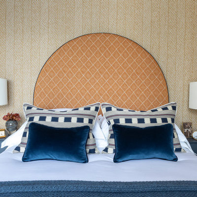 Inspiration for a contemporary bedroom remodel in London with yellow walls