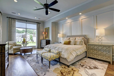 Example of a transitional bedroom design in Houston