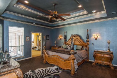 Example of an eclectic bedroom design in Dallas
