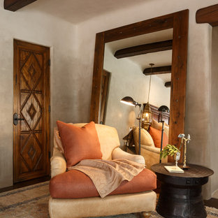 Example of a large southwest master dark wood floor bedroom design in Albuquerque with gray walls and no fireplace