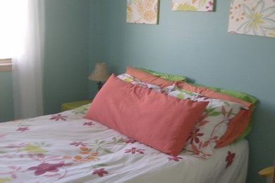 Example of an island style bedroom design in Calgary