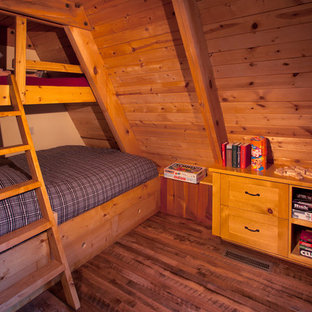 Small shabby-chic style guest bedroom in Albuquerque with beige walls and medium hardwood floors.