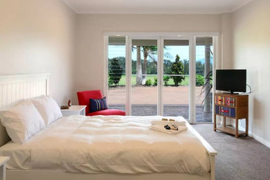Design ideas for a modern bedroom in Wollongong.