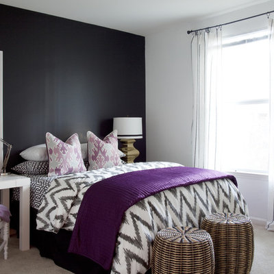 Eclectic bedroom photo in Atlanta with black walls