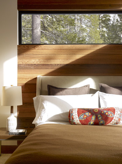 Rustic Bedroom by John Maniscalco Architecture