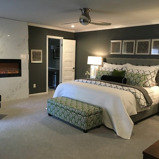 Imagen de dormitorio principal, contemporáneo, grande, con paredes verdes, moqueta, chimenea lineal y marco de chimenea de baldosas y/o azulejos