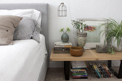 Photo of a beach style bedroom in Toronto.