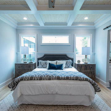 Sunlight enters both the master bedroom and adjacent bathroom