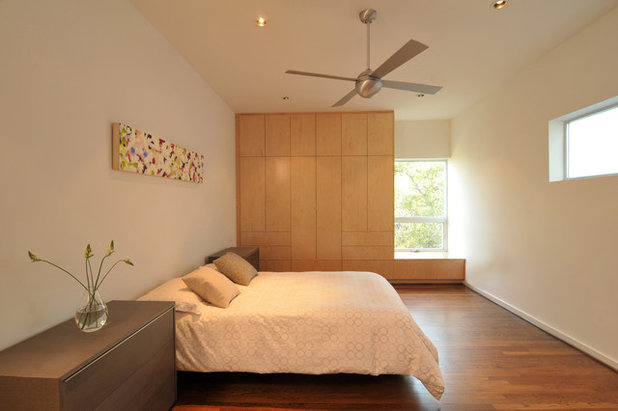 Modern Bedroom by Intexure Architects
