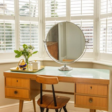 Teal dressing table and vintage mirror