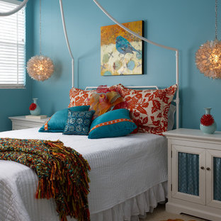 Bedroom - mid-sized contemporary carpeted bedroom idea in Miami with blue walls