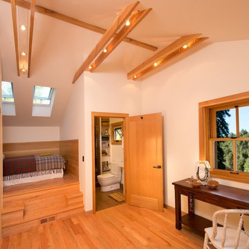 The Bedroom Suite: open beam ceiling, solar powered skylights for ventilation.
