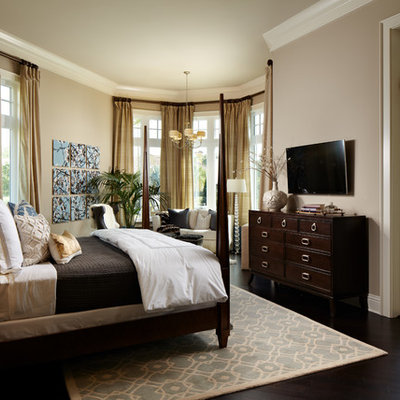 Inspiration for a large timeless master dark wood floor bedroom remodel in Tampa with brown walls and no fireplace