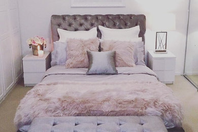 This is an example of a shabby-chic style grey and pink bedroom in Other.