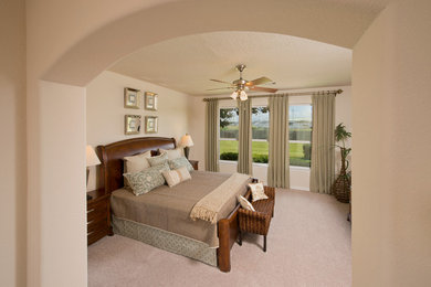 Large elegant master carpeted and beige floor bedroom photo in Houston with beige walls and no fireplace
