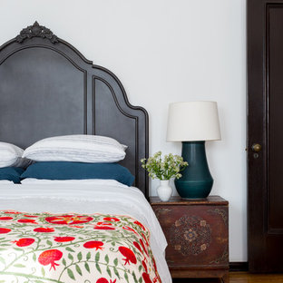 Example of a tuscan bedroom design in Los Angeles