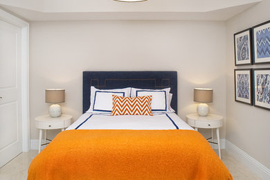 Example of a transitional bedroom design in Miami