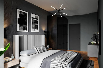 Photo of a small contemporary master bedroom in London with grey walls, medium hardwood flooring and wallpapered walls.