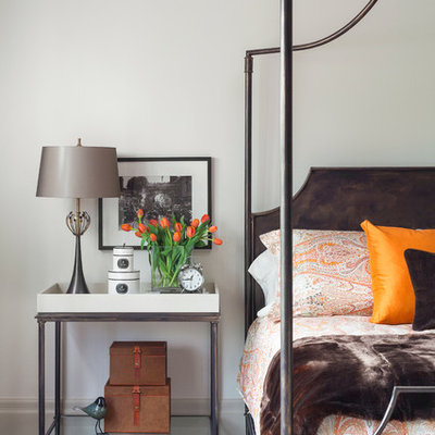 Inspiration for a timeless master dark wood floor bedroom remodel in Toronto with white walls