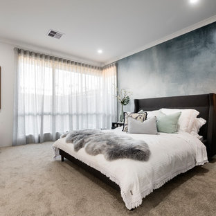 Photo of a mid-sized contemporary master bedroom in Perth with white walls, carpet and grey floor.
