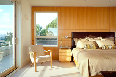 Inspiration for a large contemporary master carpeted bedroom remodel in San Francisco with white walls