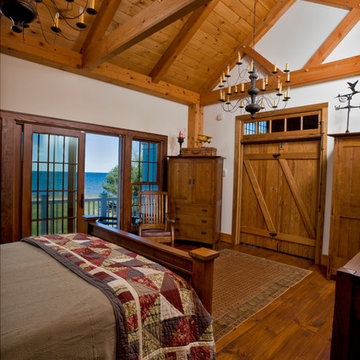 Timber Frame Master Bedroom with Barn Doors