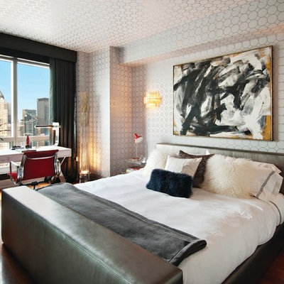Minimalist dark wood floor bedroom photo in New York with multicolored walls