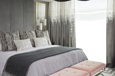 Example of a transitional master bedroom design in Toronto