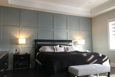 Trendy brown floor bedroom photo in Toronto with gray walls