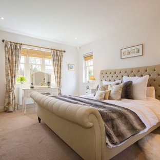 Inspiration for a classic bedroom in Other with white walls, carpet, no fireplace and beige floors.